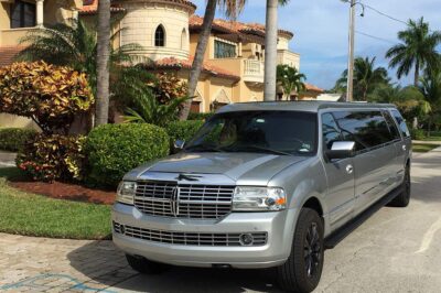 Silver Lincoln Navigator Limo